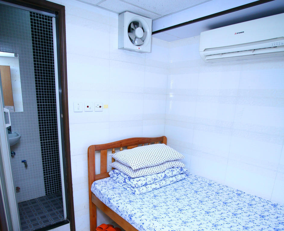 H K Commercial Inn Цзюлун Номер фото