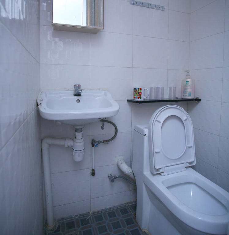 H K Commercial Inn Цзюлун Номер фото