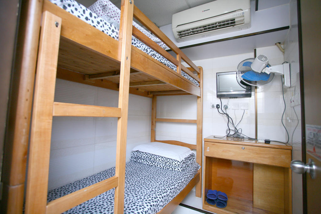 H K Commercial Inn Цзюлун Номер фото