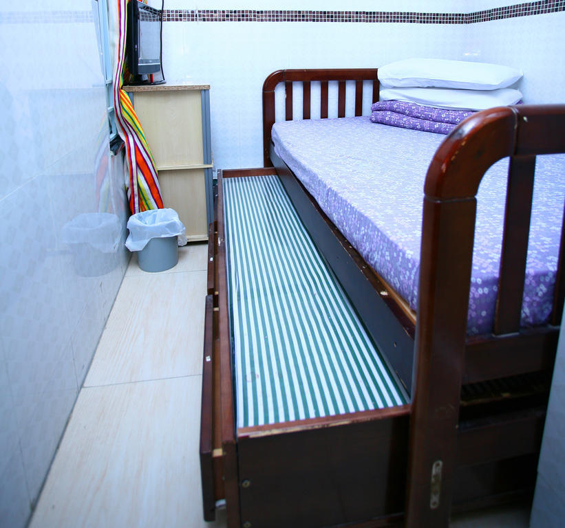 H K Commercial Inn Цзюлун Номер фото