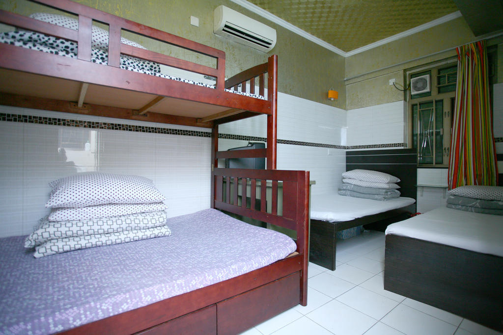 H K Commercial Inn Цзюлун Номер фото