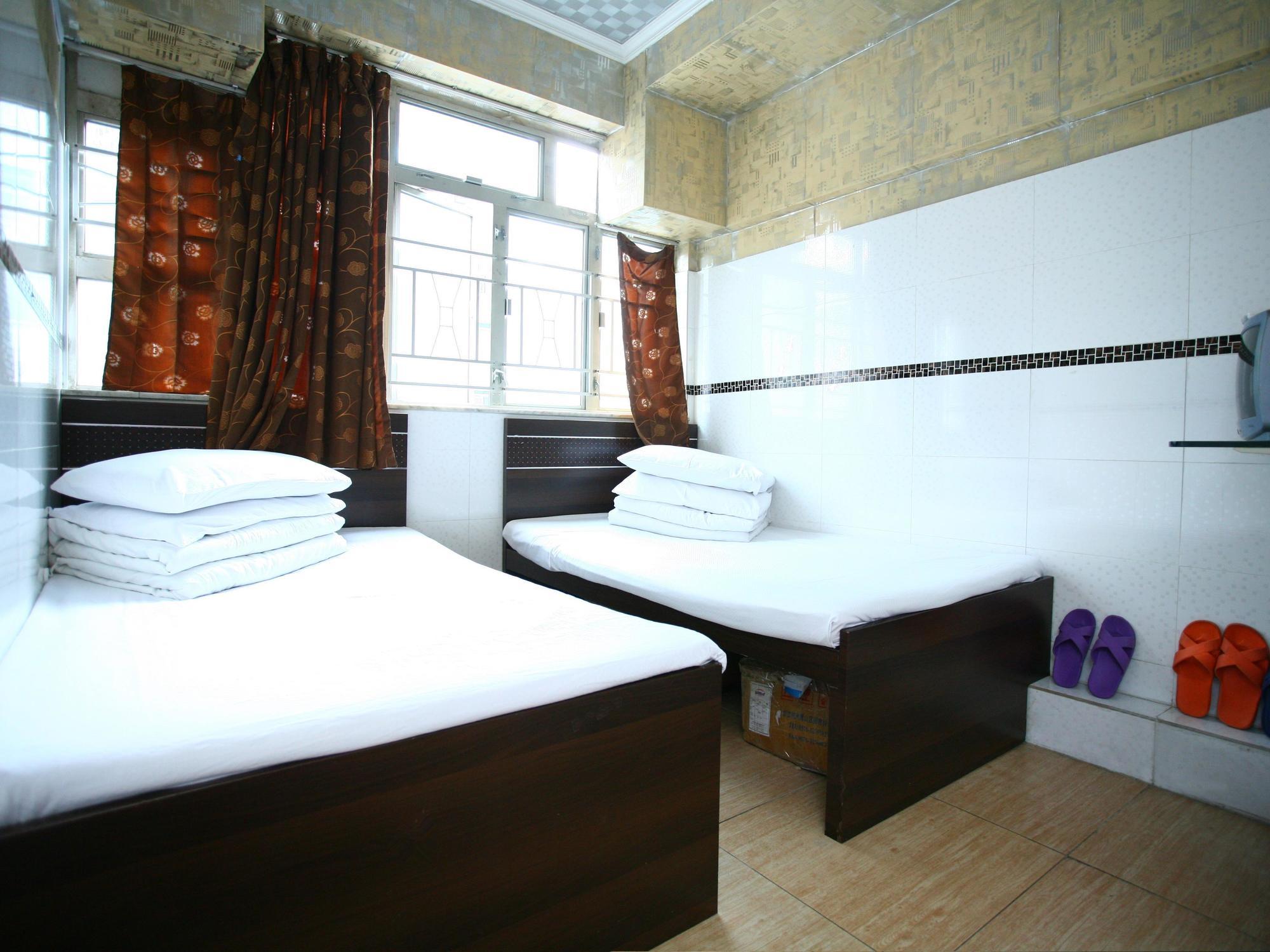 H K Commercial Inn Цзюлун Экстерьер фото