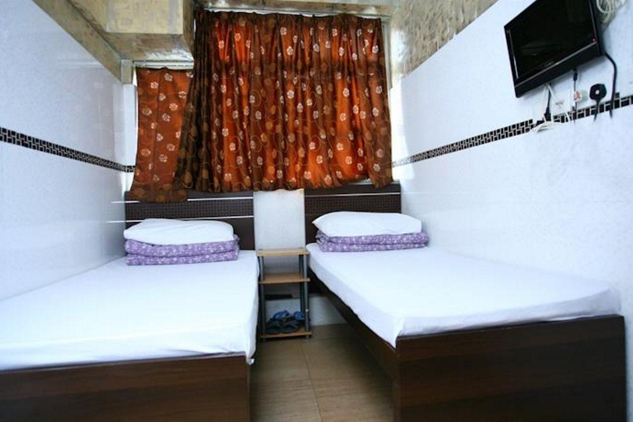 H K Commercial Inn Цзюлун Экстерьер фото