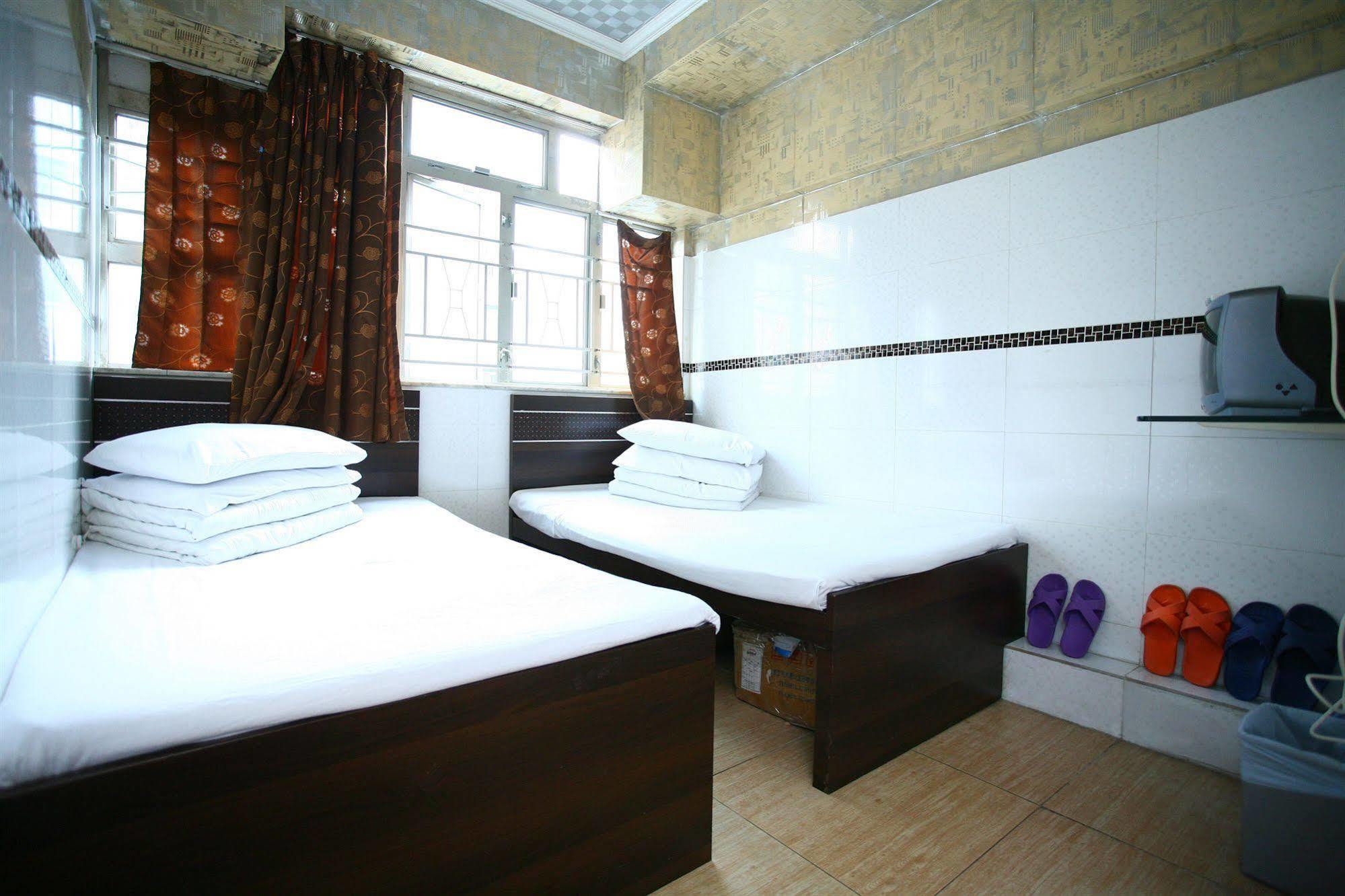 H K Commercial Inn Цзюлун Экстерьер фото