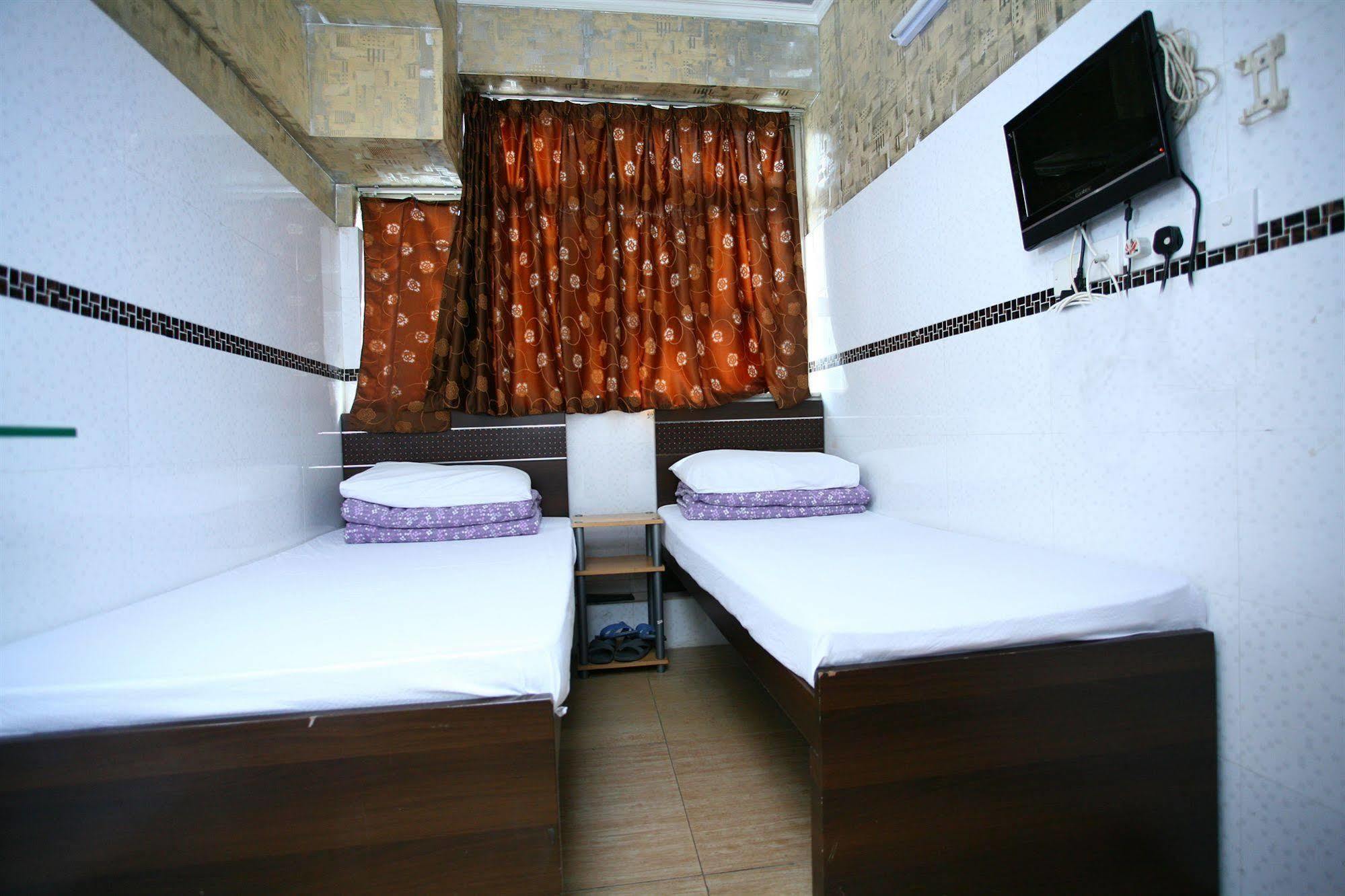 H K Commercial Inn Цзюлун Экстерьер фото