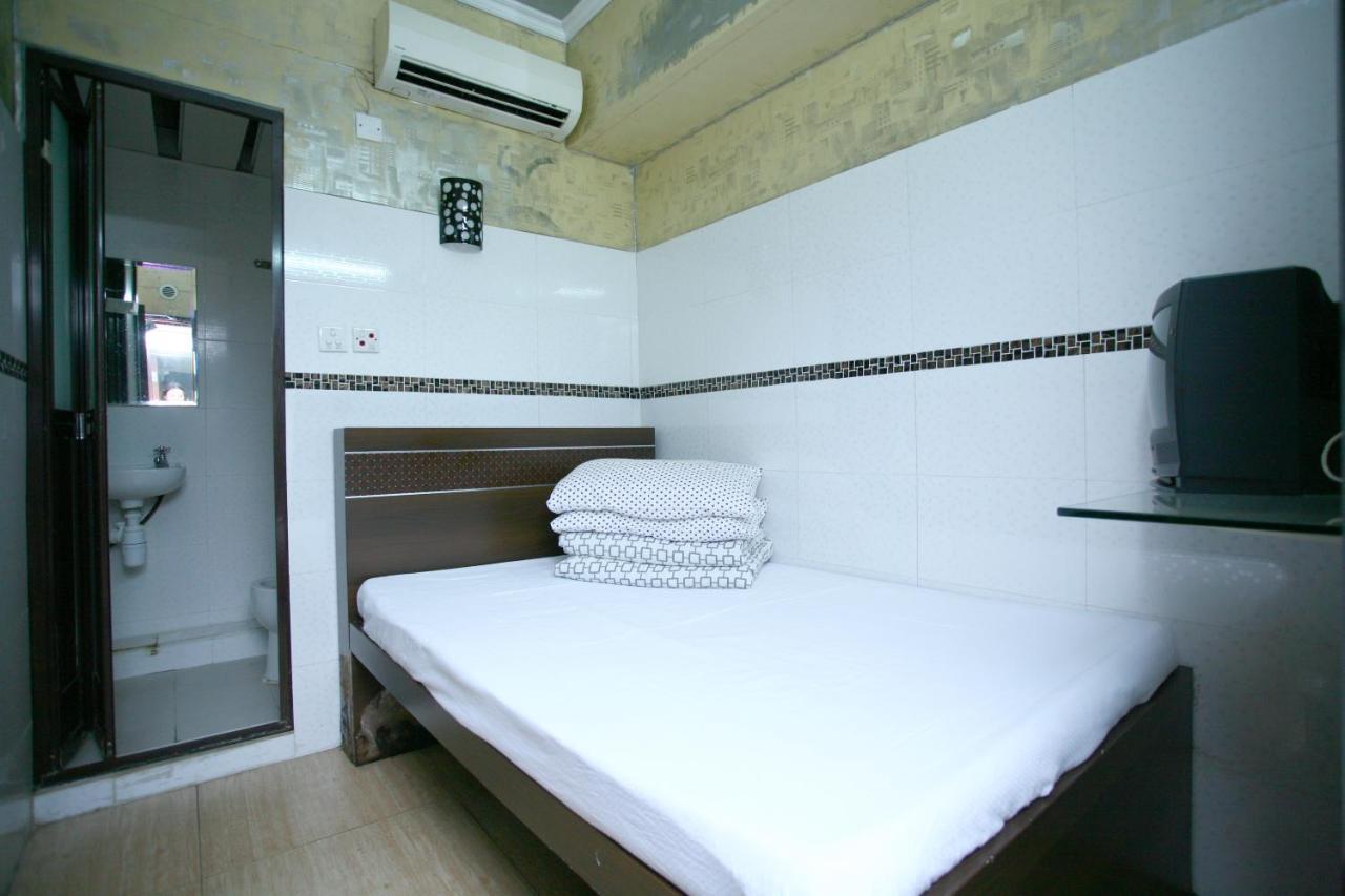 H K Commercial Inn Цзюлун Номер фото